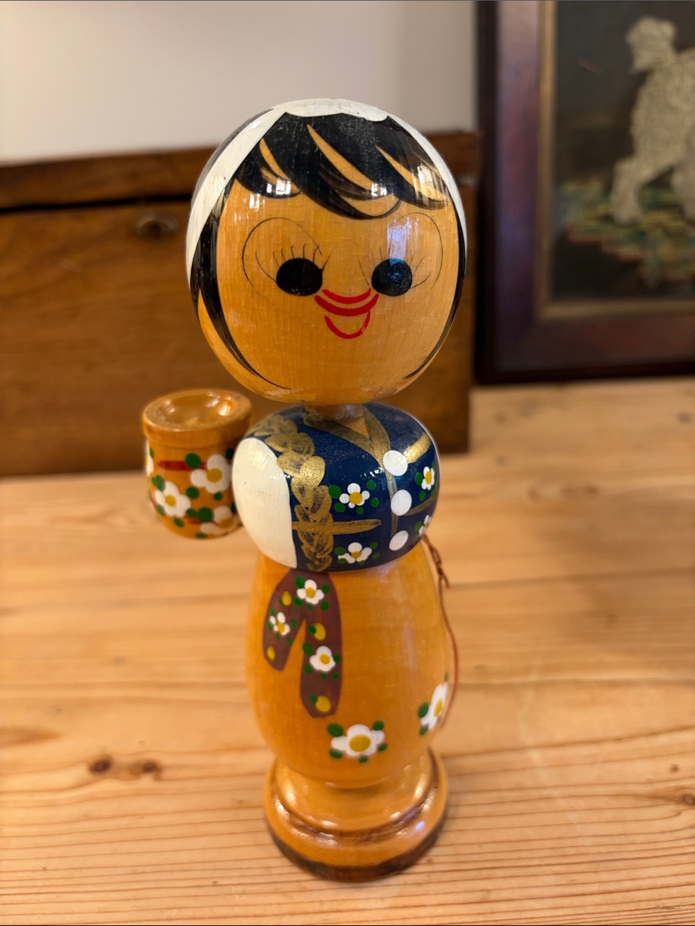 Hand-Painted Wood Figurine in Yellow and Blue